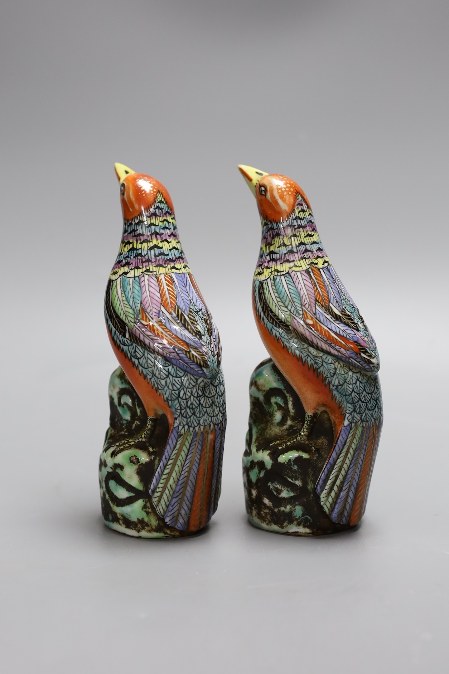 A pair of Chinese Republic ceramic birds, 19 cms high
